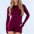 Wine long-sleeve one-piece with a crew neck and shorts-length legs, front view